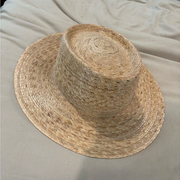 Lack of color hat. Never worn.